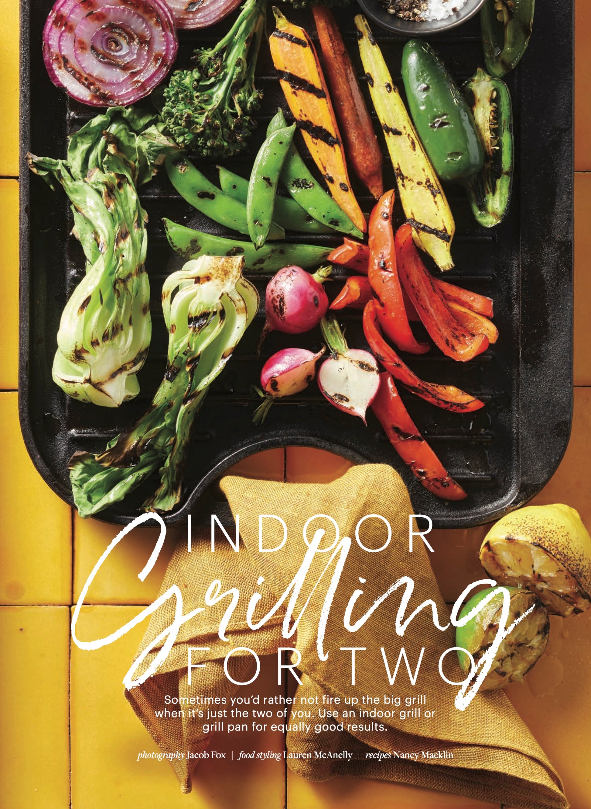 A colorful tray of grilled veggies that have been grilled inside